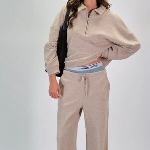 Beige knit polo and matching wide-leg pants from Kuwalla Tees (Montreal)